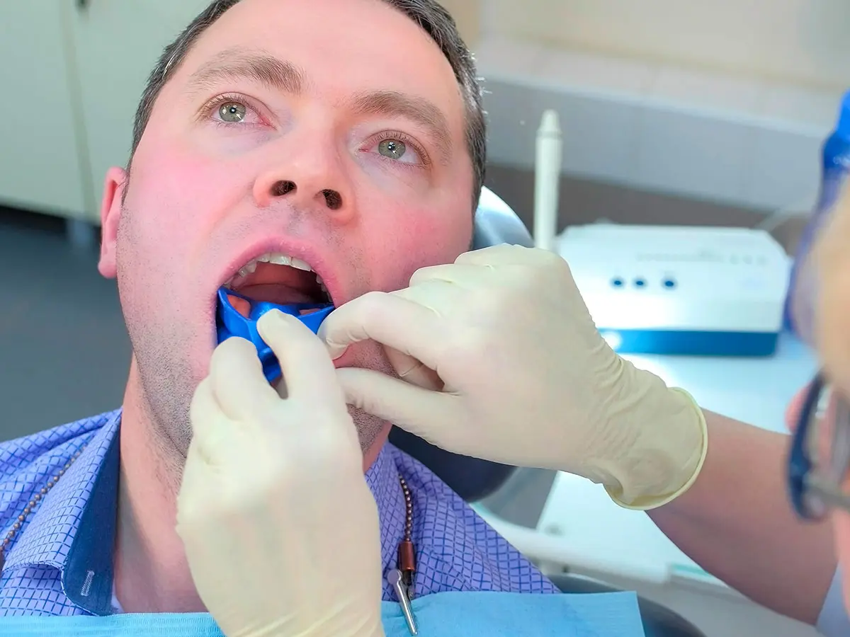 Man Recieving A Fluoride Treatment in Columbus, OH